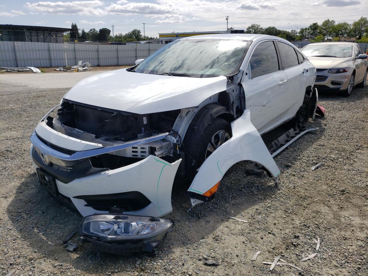 Photo 2 from auction – 2017 HONDA CIVIC LX with VIN 19XFC2F53HE231400