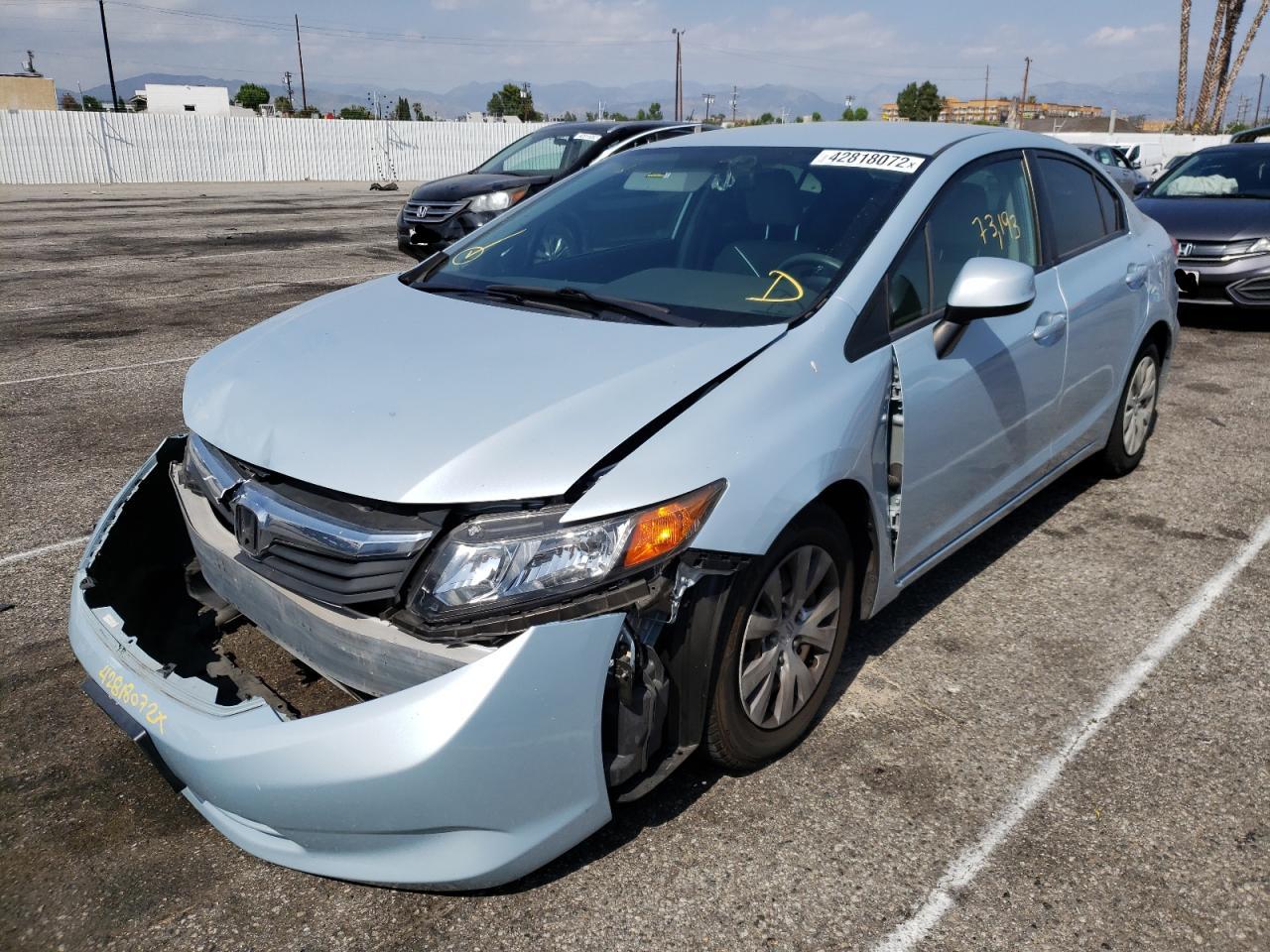 Photo 2 from auction – 2012 HONDA CIVIC LX with VIN JHMFB2F54CS002604