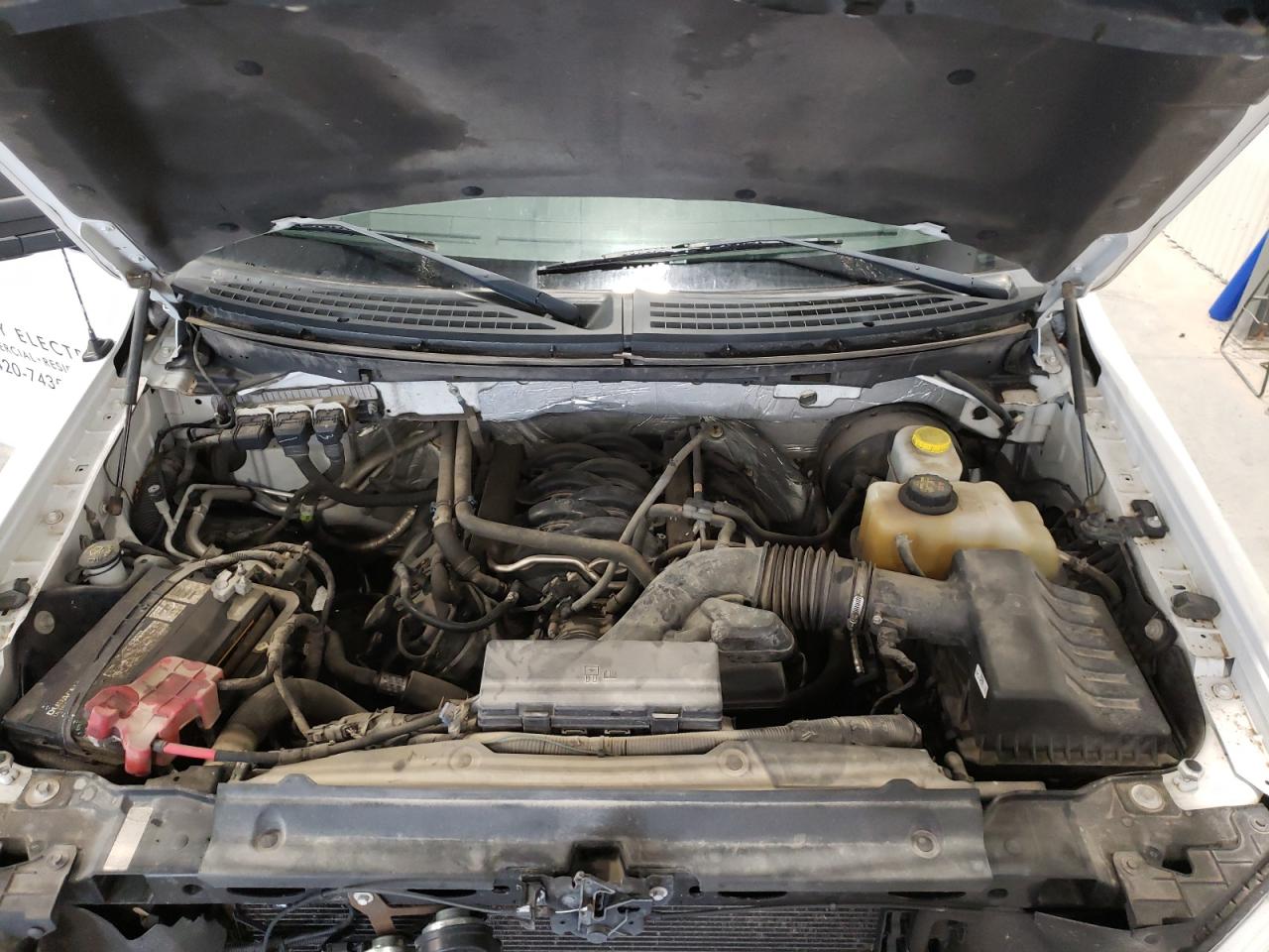 Photo 7 from auction – 2014 FORD F150 with VIN 1FTNF1CF7EKD20812
