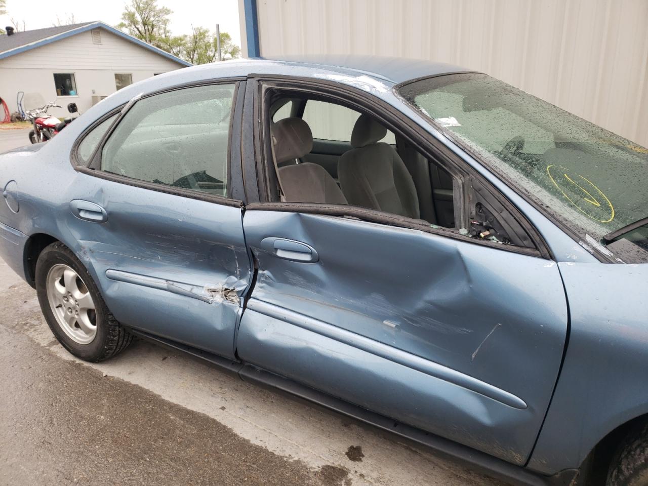 Photo 9 from auction – 2005 FORD TAURUS with VIN 1FAFP53265A235719