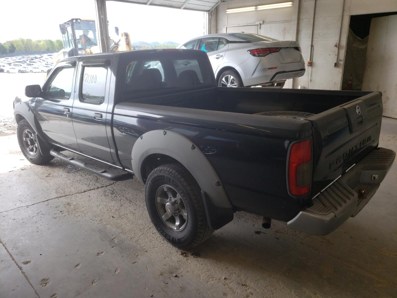 Photo 3 from auction – 2003 NISSAN FRONTIER C with VIN 1N6ED29Y83C417235
