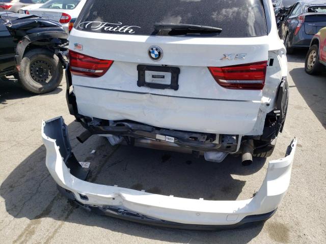Photo 9 from auction – 2014 BMW X5 XDRIVE3 with VIN 5UXKR0C51E0K47846