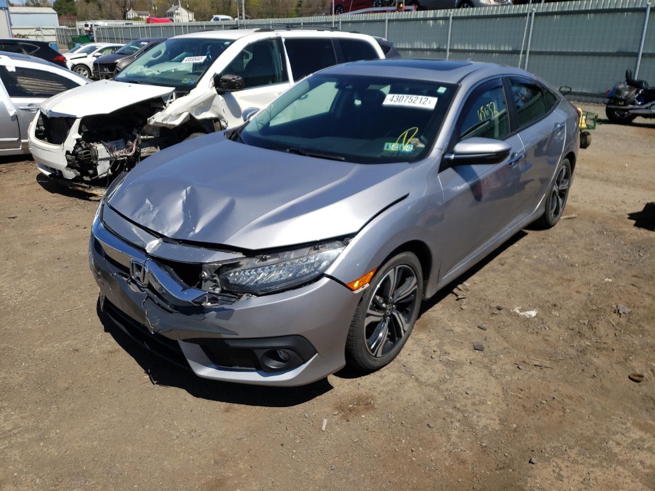 Photo 2 from auction – 2016 HONDA CIVIC TOUR with VIN 2HGFC1F98GH646925