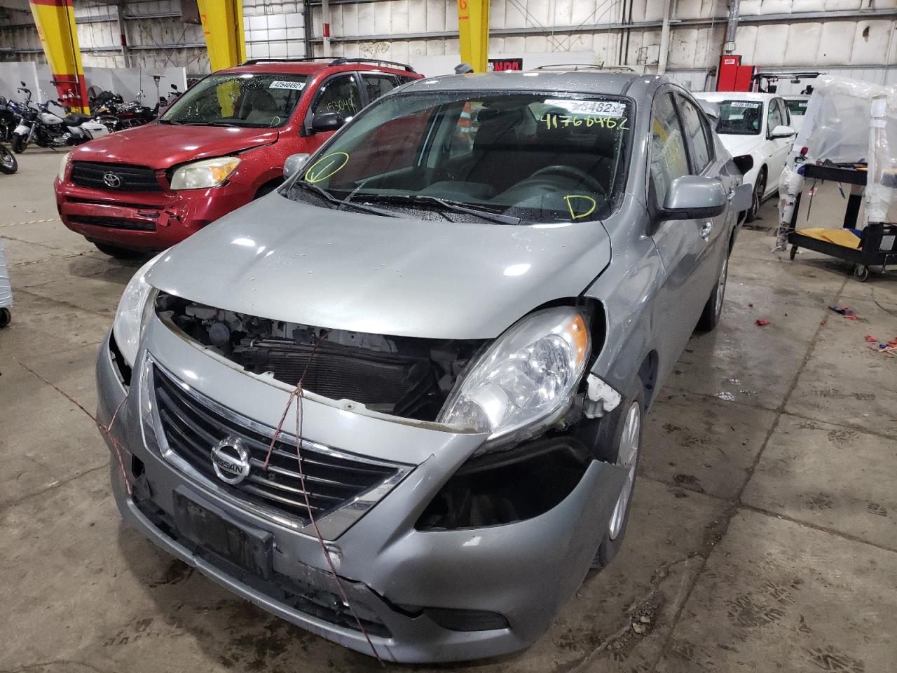 Photo 2 from auction – 2014 NISSAN VERSA S with VIN 3N1CN7AP8EL835523