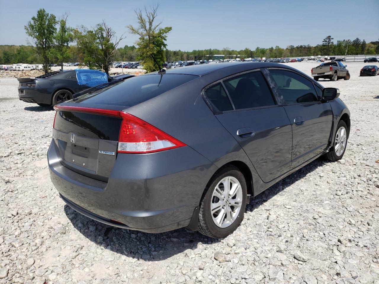 Photo 4 from auction – 2010 HONDA INSIGHT with VIN JHMZE2H74AS030211