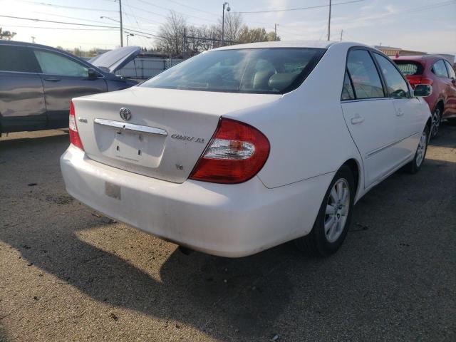 Photo 4 from auction – 2002 TOYOTA CAMRY LE with VIN 4T1BF30K62U011277