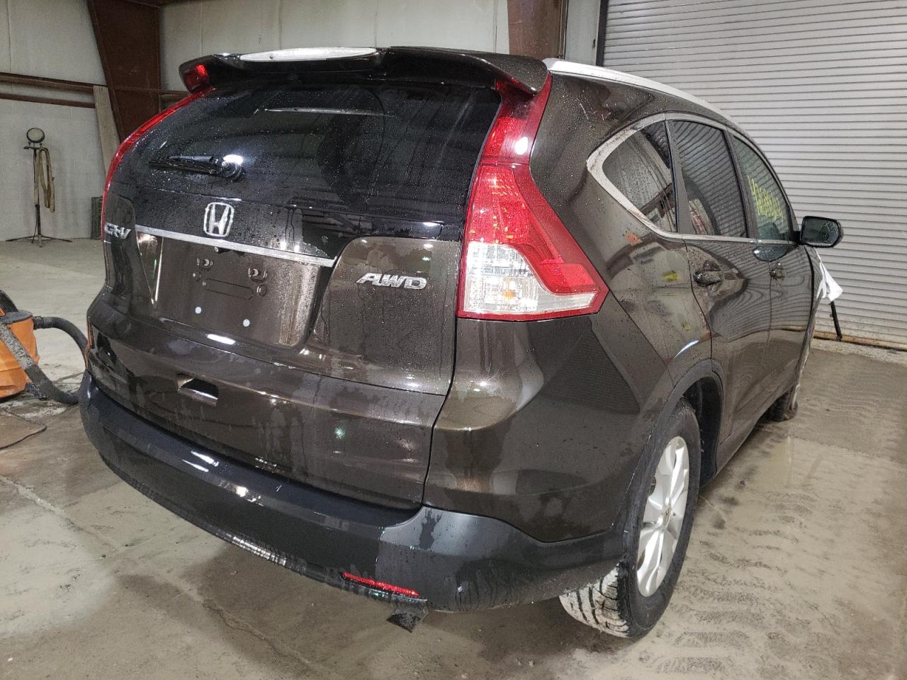 Photo 4 from auction – 2013 HONDA CR-V EXL with VIN 5J6RM4H73DL074841