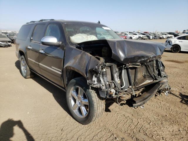CHEVROLET SUBURBAN 2011 with VIN 1GNSKKE34BR244743 - Photo from auction
