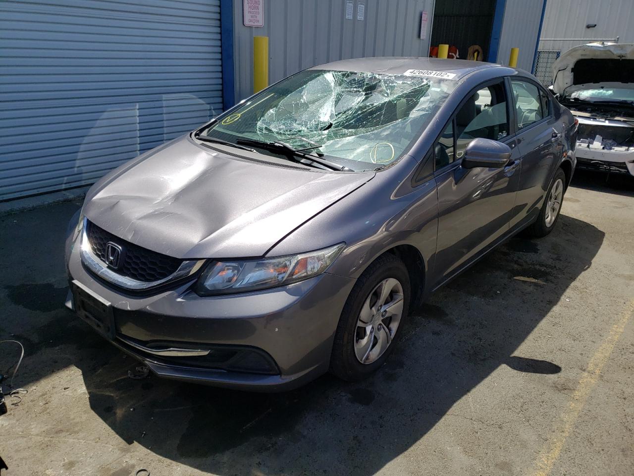 Photo 2 from auction – 2014 HONDA CIVIC LX with VIN 19XFB2F51EE231684