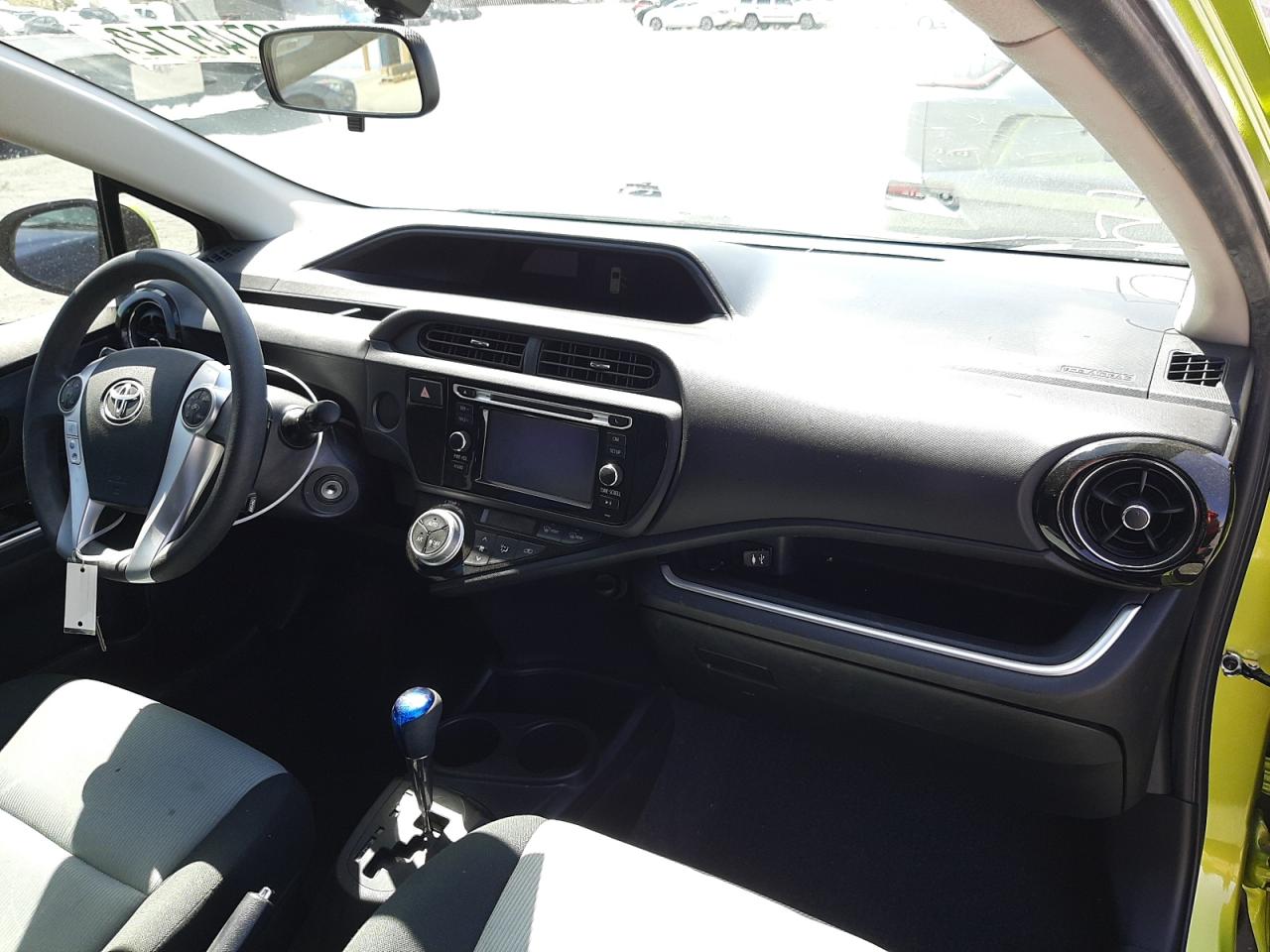 Photo 9 from auction – 2015 TOYOTA PRIUS C with VIN JTDKDTB38F1101439
