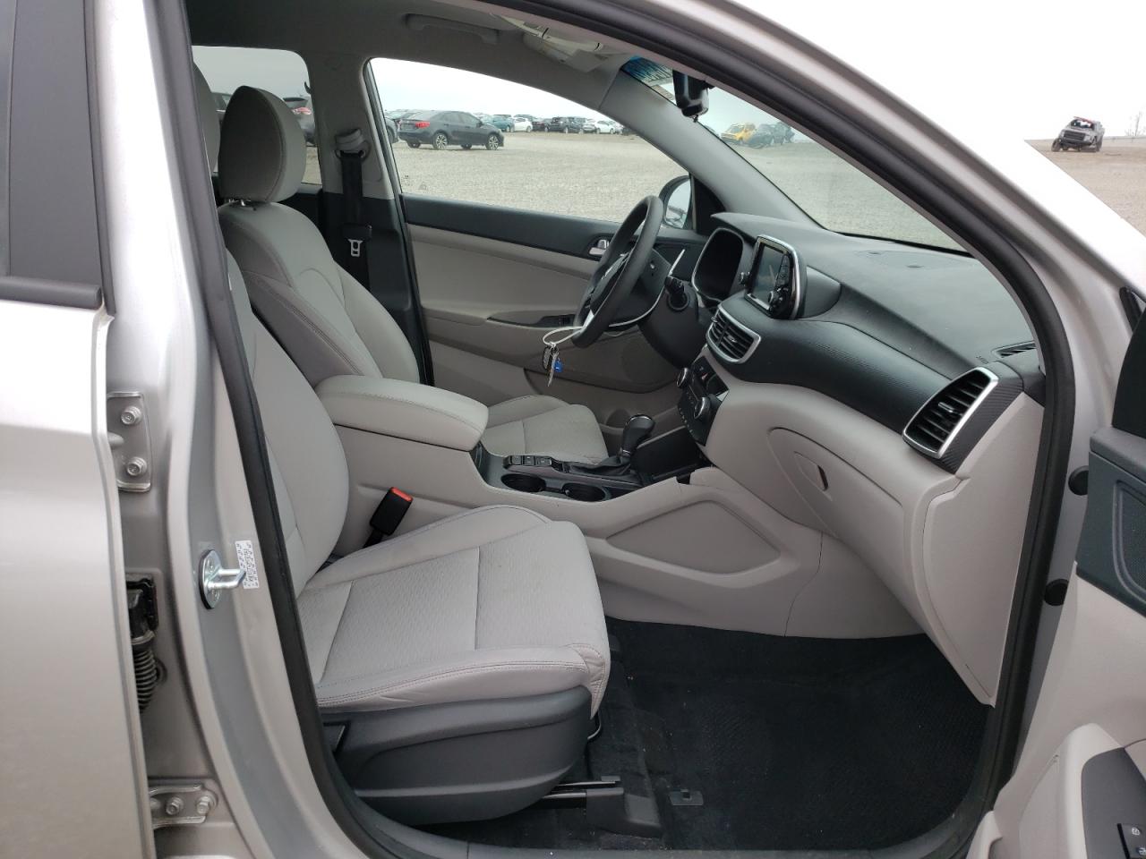 Photo 5 from auction – 2020 HYUNDAI TUCSON LIM with VIN KM8J3CA47LU121860