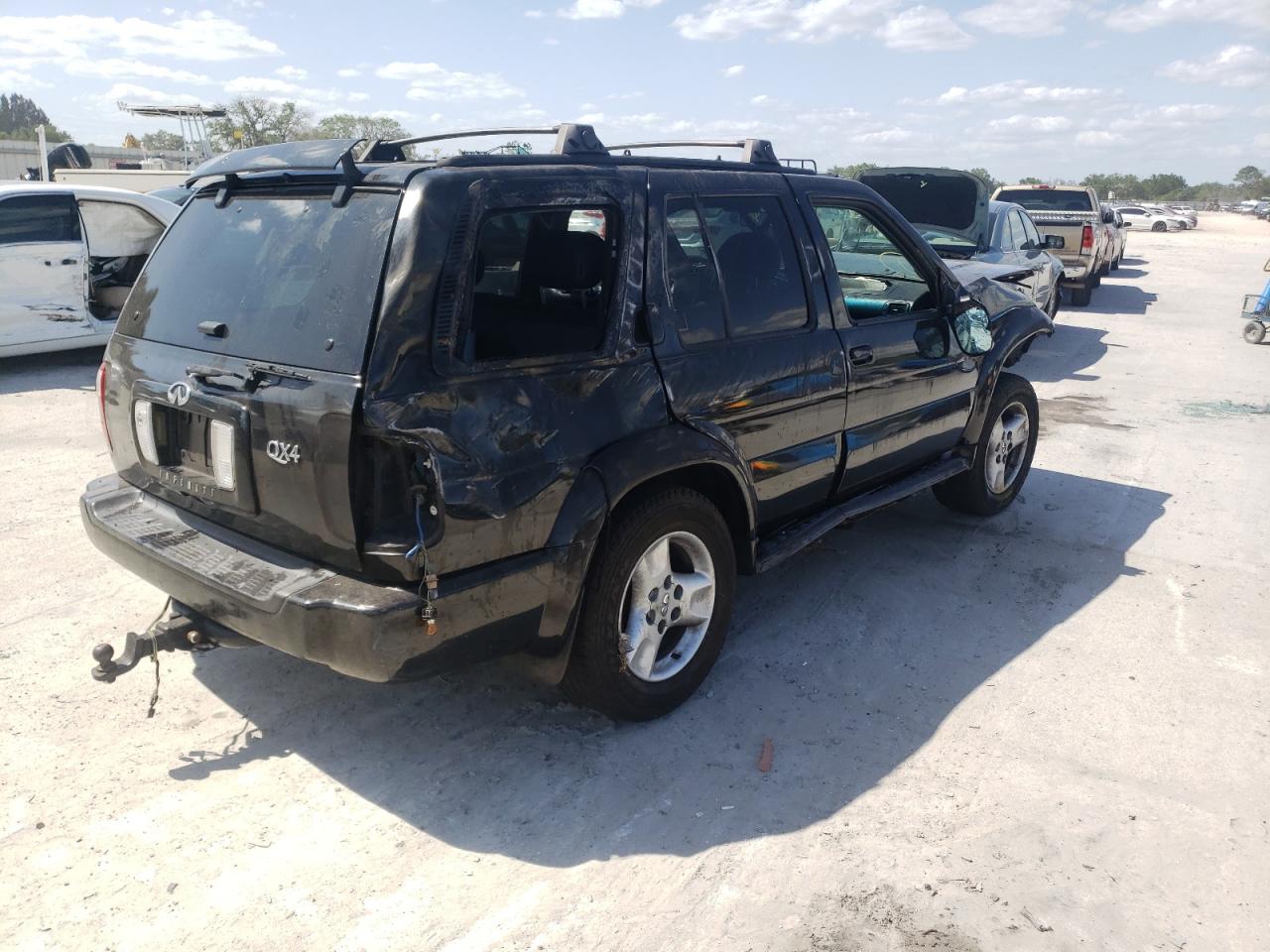 Photo 4 from auction – 2001 INFINITI QX4 with VIN JNRDR09Y51W211399