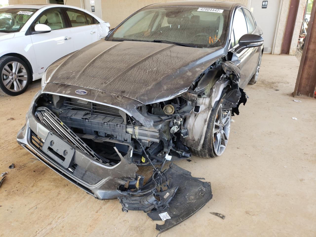 Photo 2 from auction – 2016 FORD FUSION TIT with VIN 3FA6P0K99GR255456