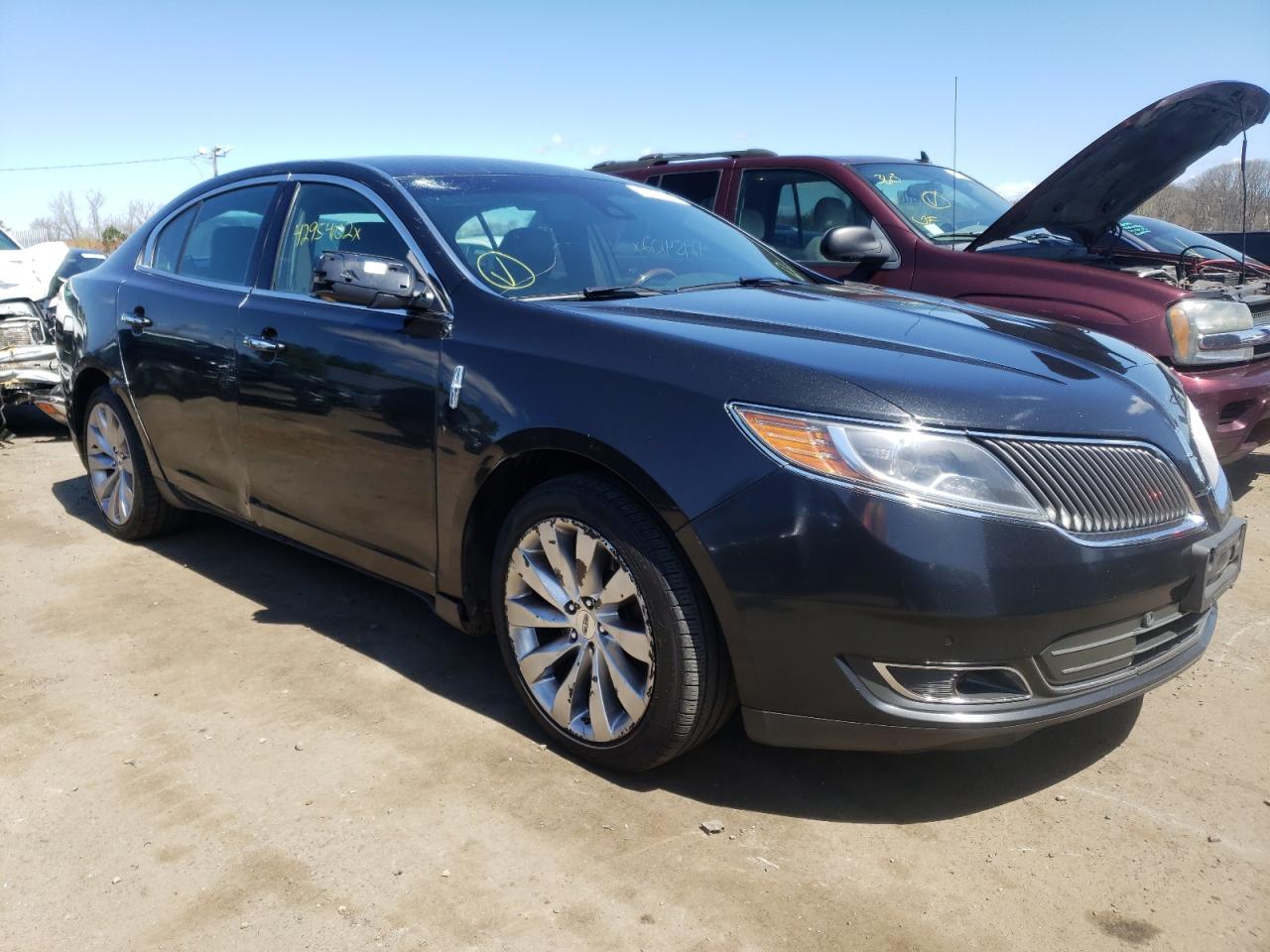 LINCOLN MKS 2015 مع رقم تعريف المركبة 1LNHL9DK5FG600342 - صورة من المزاد