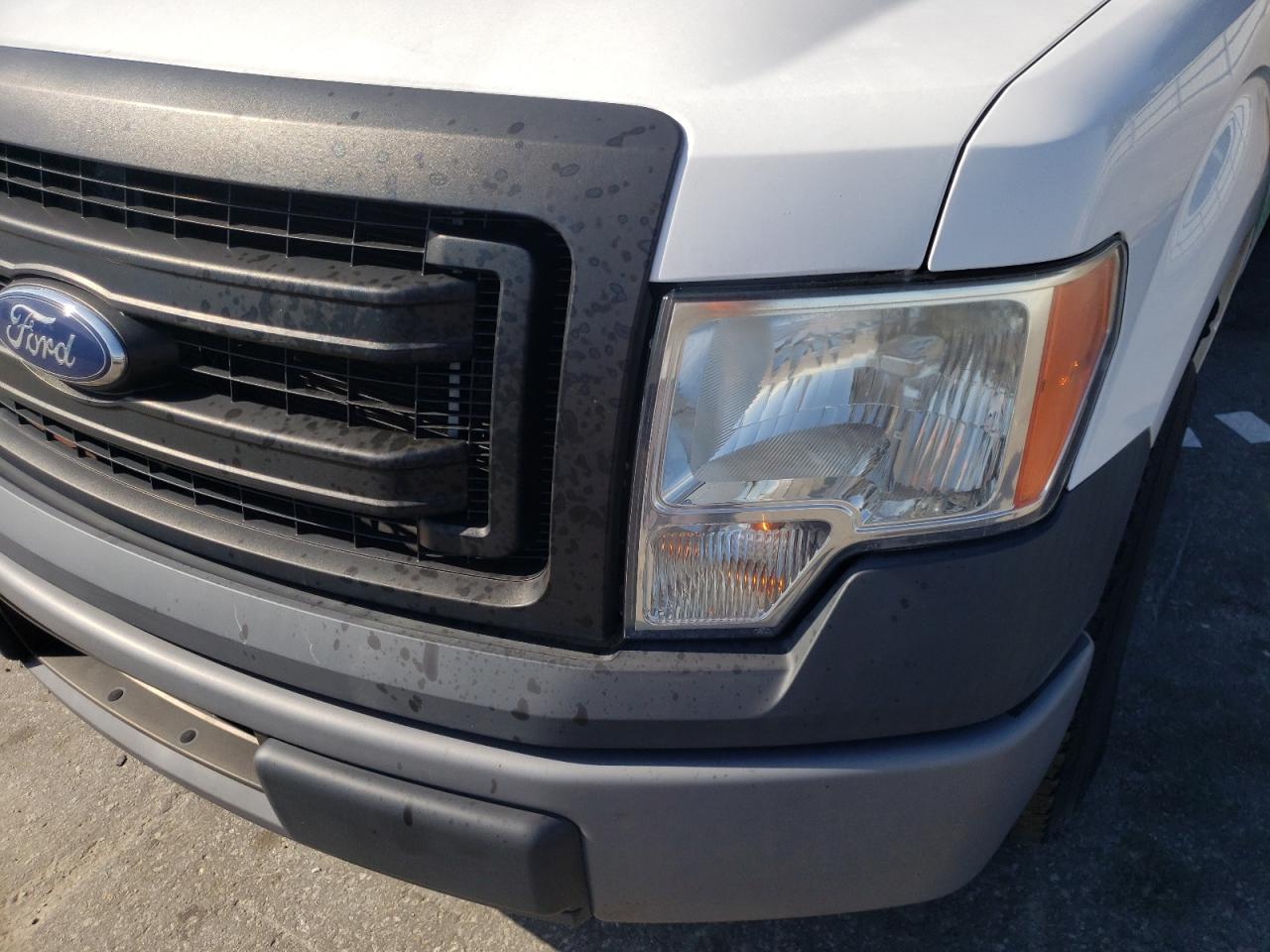 Photo 9 from auction – 2014 FORD F150 with VIN 1FTMF1CM0EKD82661