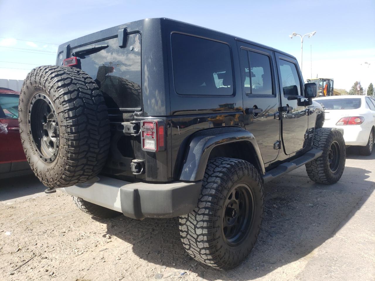 Photo 4 from auction – 2011 JEEP WRANGLER U with VIN 1J4HA5H12BL563296
