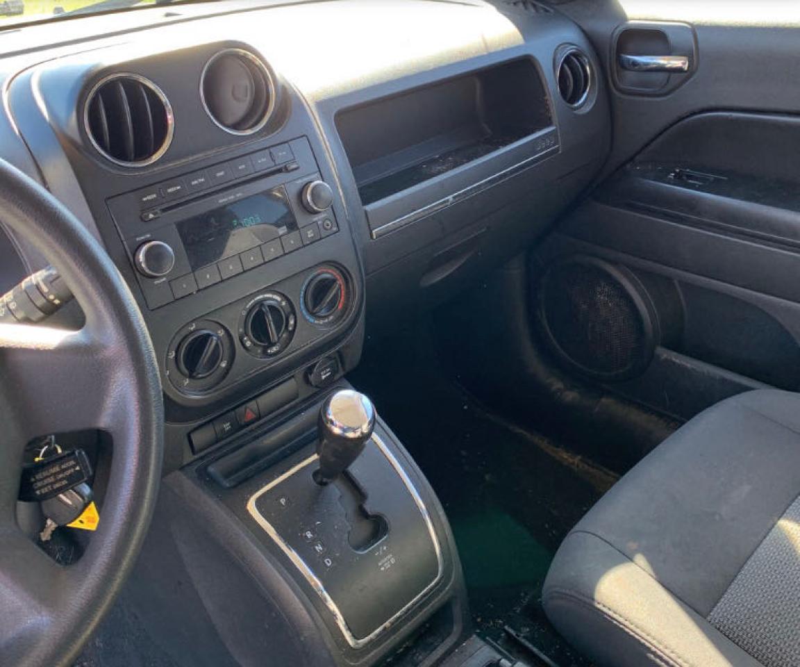 Photo 9 from auction – 2009 JEEP PATRIOT SP with VIN 1J4FF28B69D112747