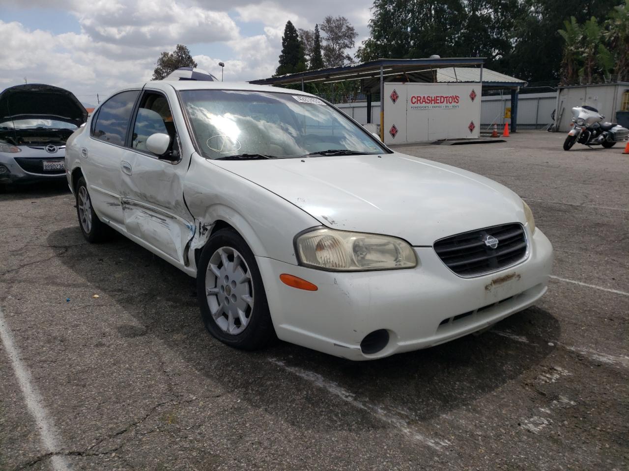 NISSAN MAXIMA GLE 2000 with VIN JN1CA31DXYT540658 - Photo from auction