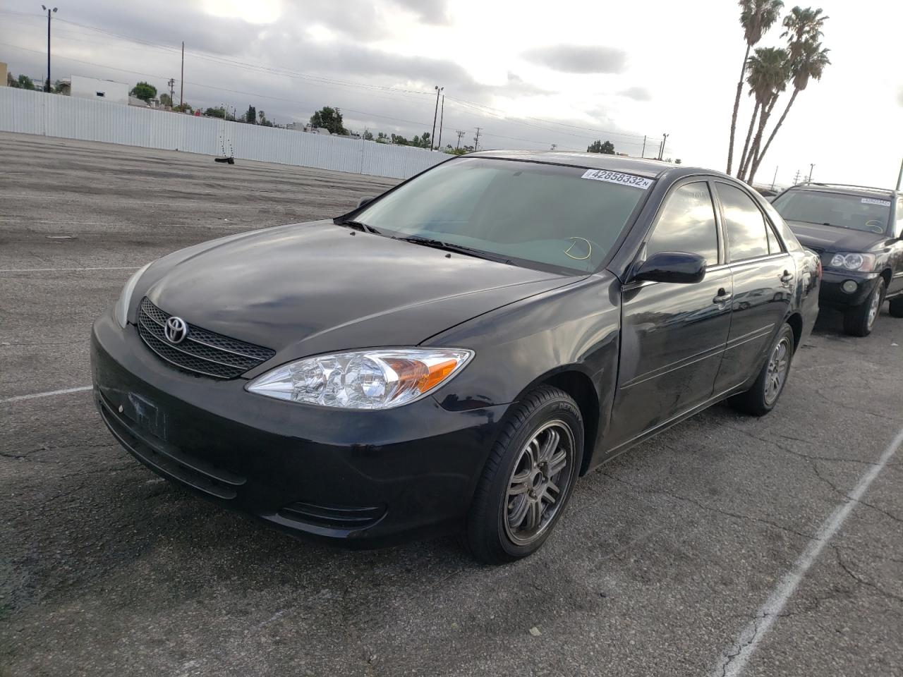 Photo 2 from auction – 2003 TOYOTA CAMRY LE with VIN JTDBE32KX30173054