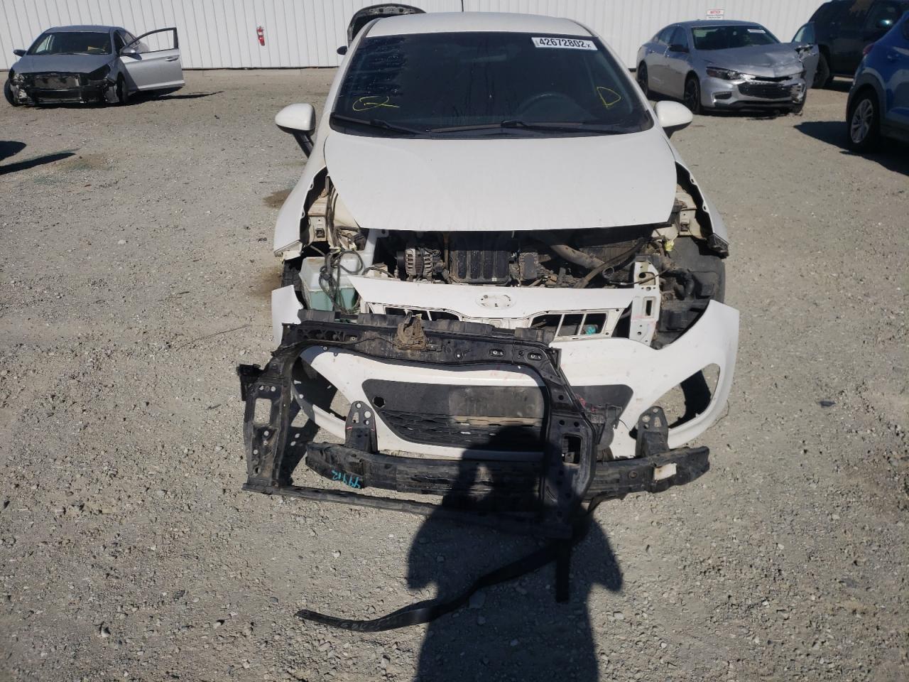 Photo 9 from auction – 2012 KIA RIO LX with VIN KNADM5A38C6039882