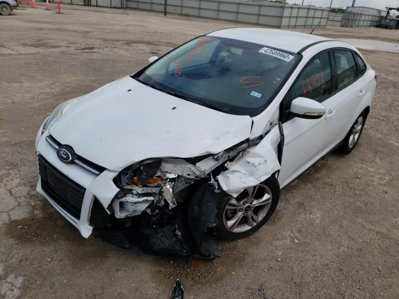 Photo 2 from auction – 2014 FORD FOCUS SE with VIN 1FADP3F20EL305520