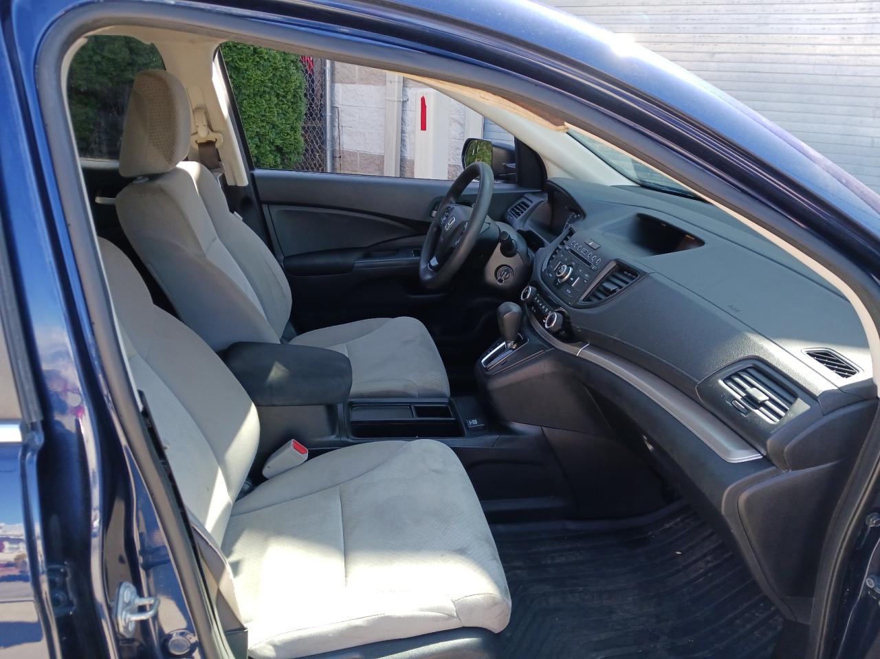 Photo 5 from auction – 2016 HONDA CR-V SE with VIN 2HKRM3H49GH562772