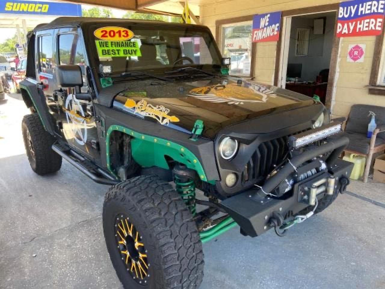 JEEP WRANGLER U 2013 with VIN 1C4HJWDG0DL594149 - Photo from auction