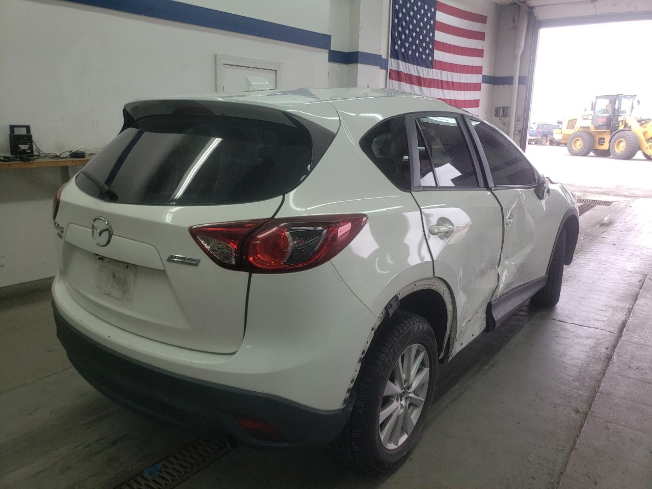 Photo 4 from auction – 2015 MAZDA CX-5 TOURI with VIN JM3KE4CY5F0482273