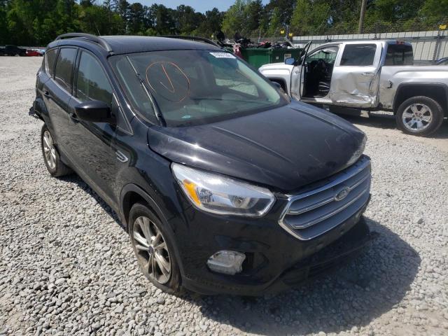 FORD ESCAPE SE 2018 with VIN 1FMCU0GD7JUB62059 - Photo from auction