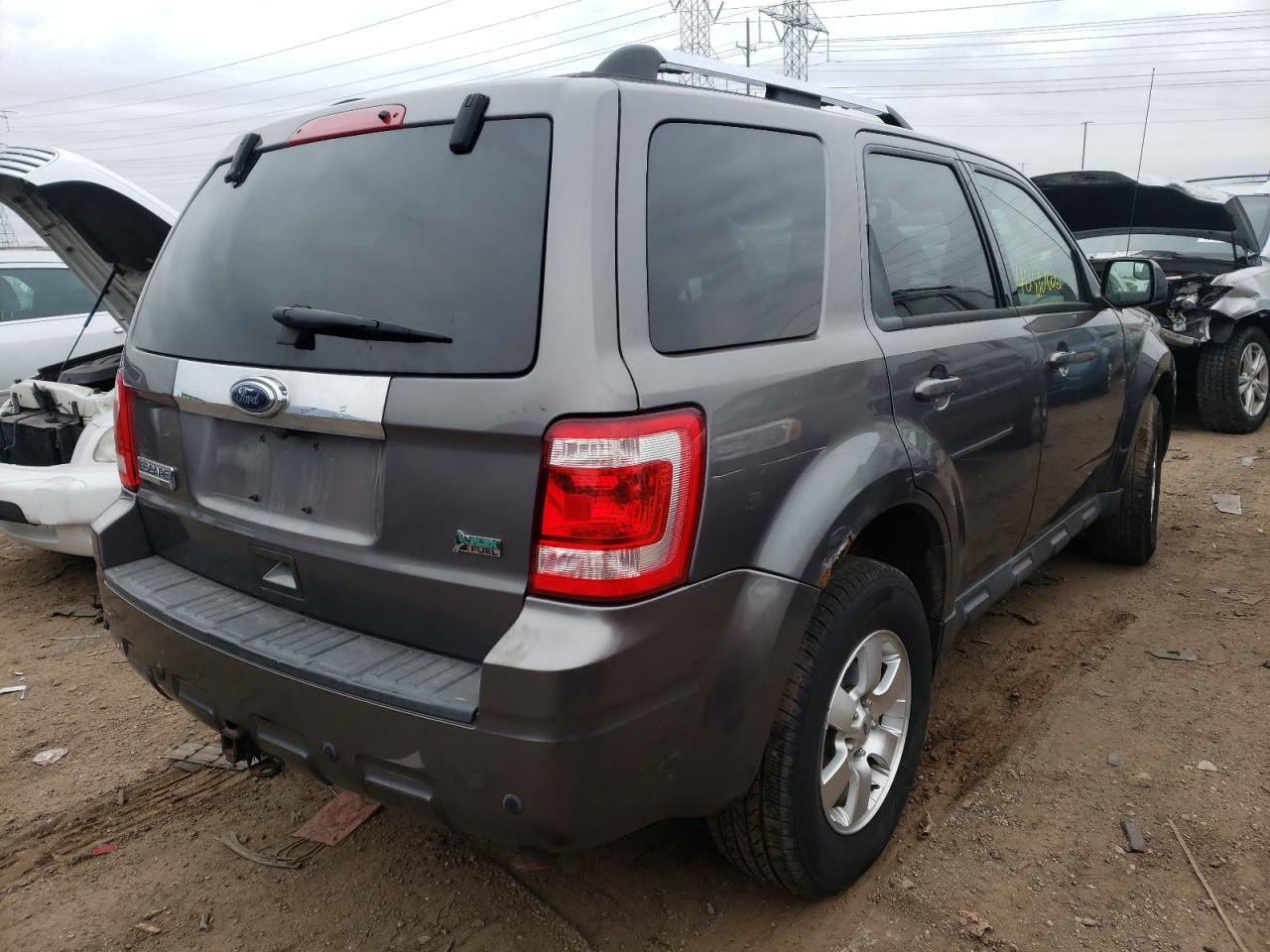 Photo 4 from auction – 2010 FORD ESCAPE LIM with VIN 1FMCU9EG7AKB50023