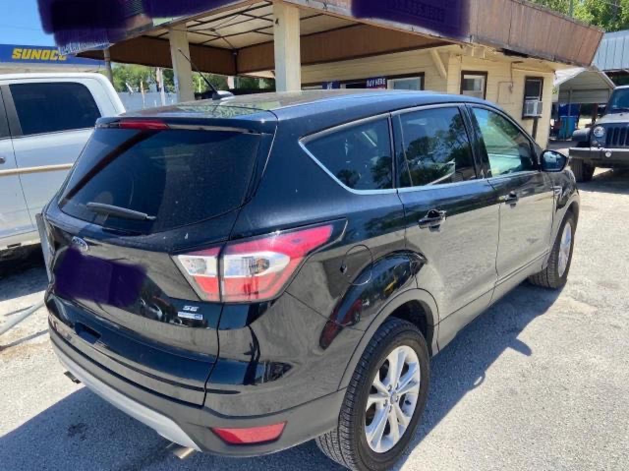 Photo 4 from auction – 2017 FORD ESCAPE SE with VIN 1FMCU9G98HUE75759