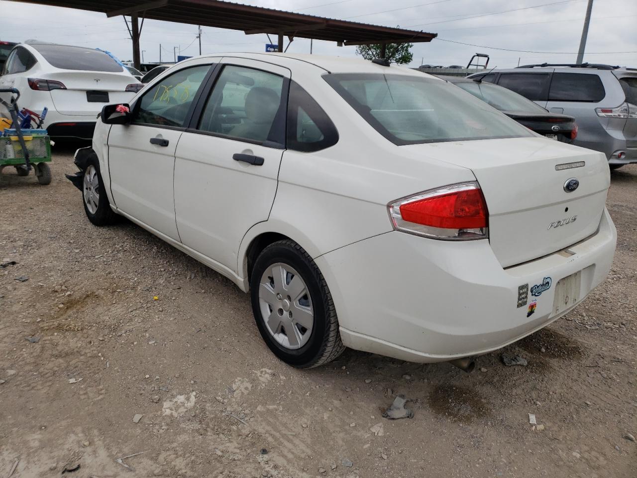 Photo 3 from auction – 2009 FORD FOCUS S with VIN 1FAHP34N99W246339