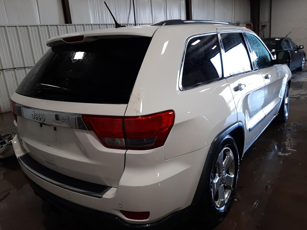Photo 4 from auction – 2011 JEEP GRAND CHER with VIN 1J4RR6GT5BC686581