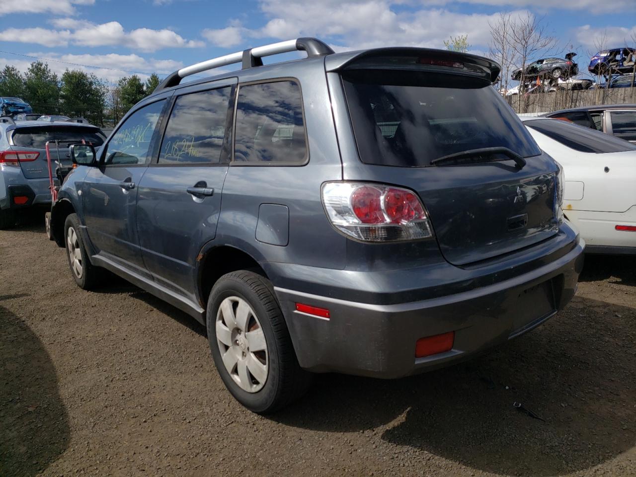 Photo 3 from auction – 2004 MITSUBISHI OUTLANDER with VIN JA4LZ41F34U004551