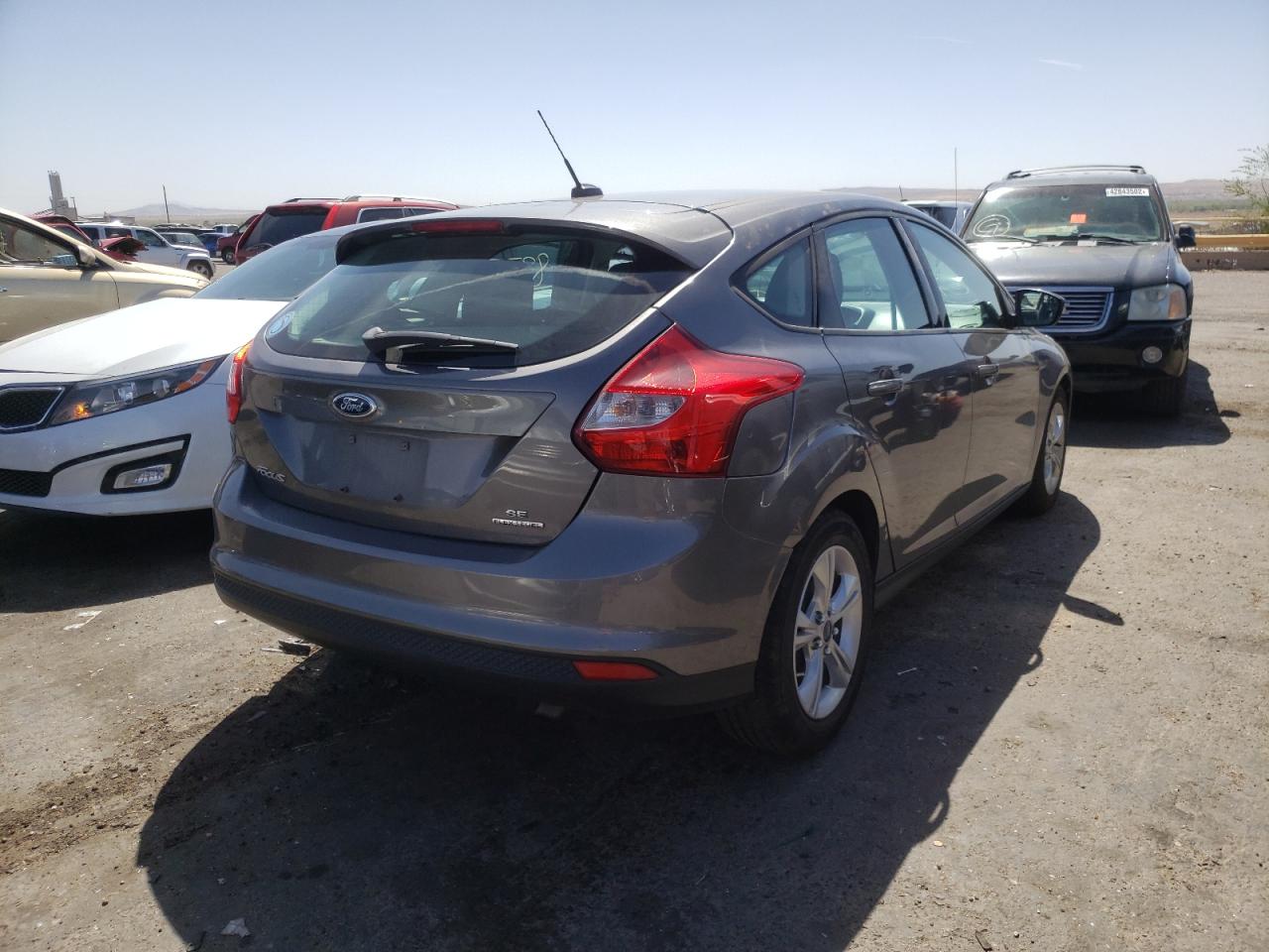 Zdjęcie 4 z aukcji – 2014 FORD FOCUS SE z VIN 1FADP3K27EL349519