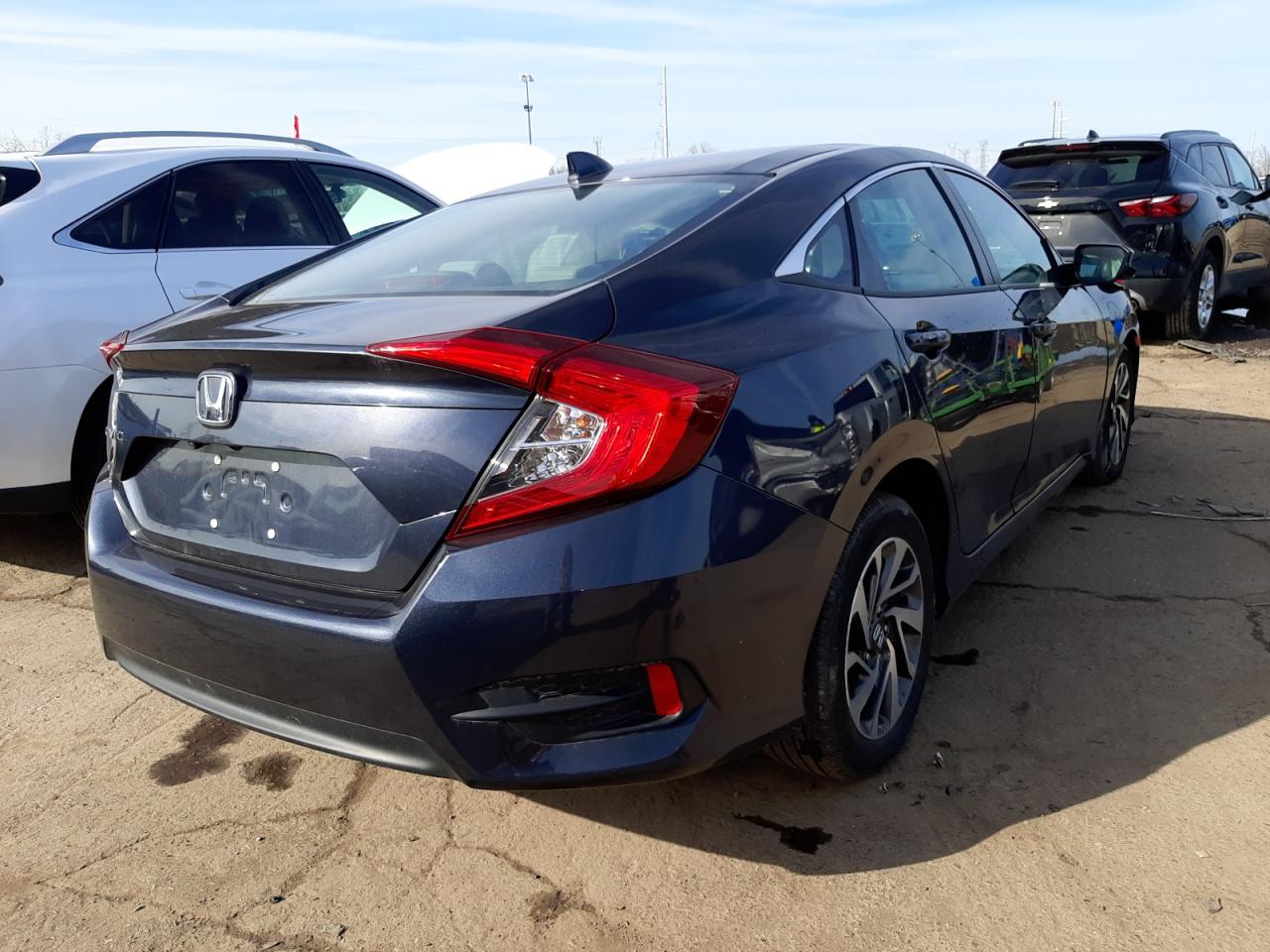 Photo 16 from auction – 2018 HONDA CIVIC EX with VIN 2HGFC2F77JH589385