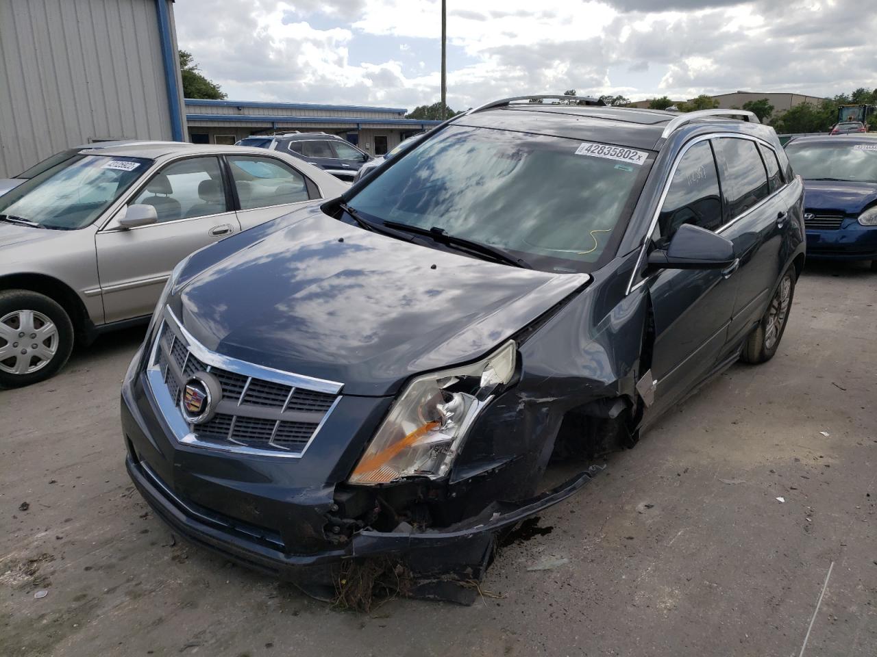 Photo 2 from auction – 2012 CADILLAC SRX LUXURY with VIN 3GYFNAE33CS612561