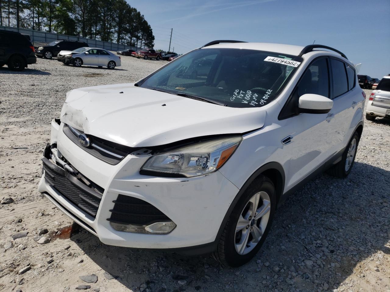 Photo 2 from auction – 2016 FORD ESCAPE SE with VIN 1FMCU0GX5GUB20010