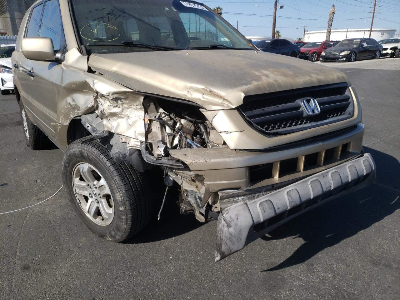 Photo 9 from auction – 2003 HONDA PILOT EX with VIN 2HKYF18415H536027