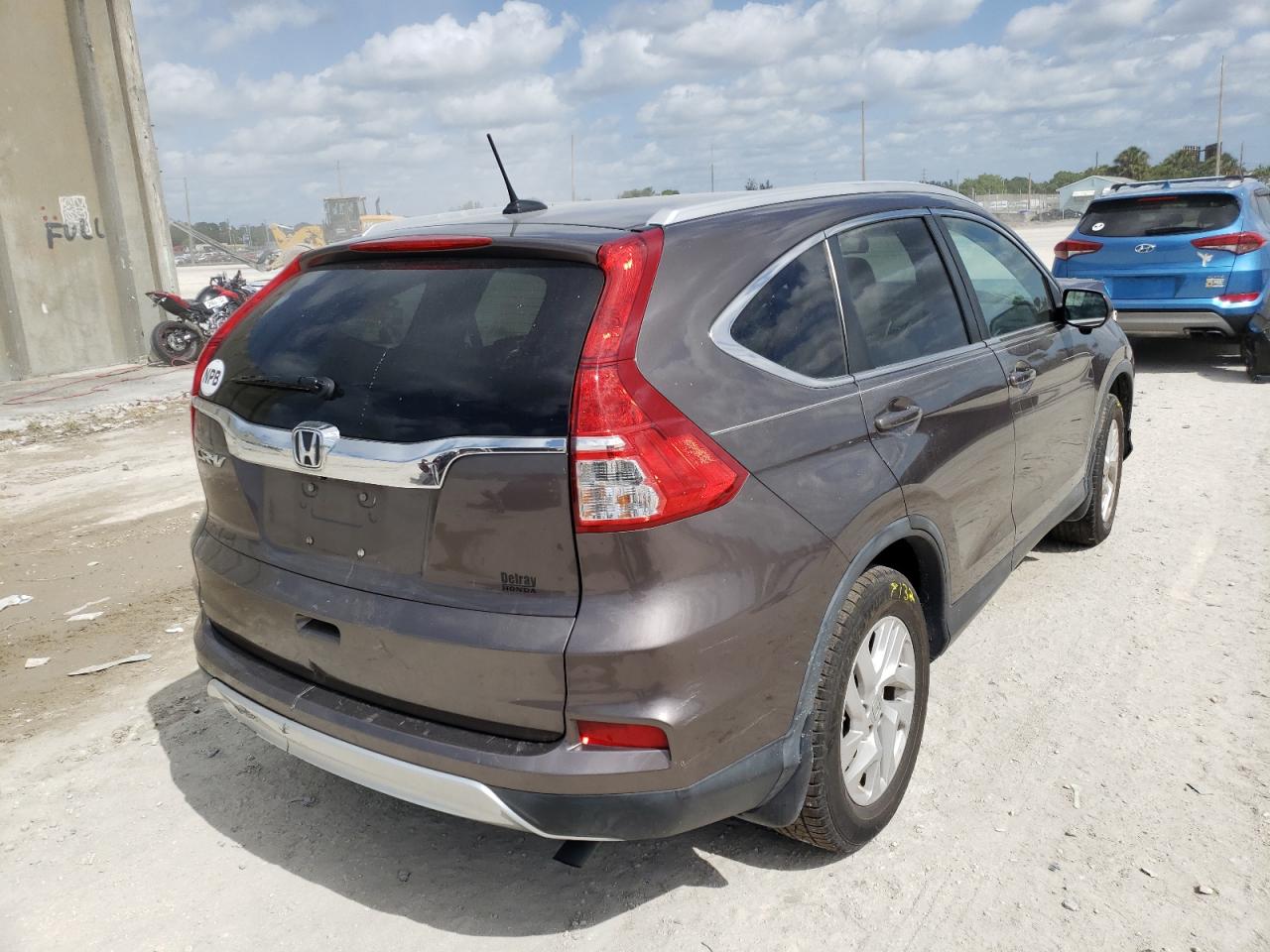 Photo 4 from auction – 2016 HONDA CR-V EXL with VIN 2HKRM3H78GH529997