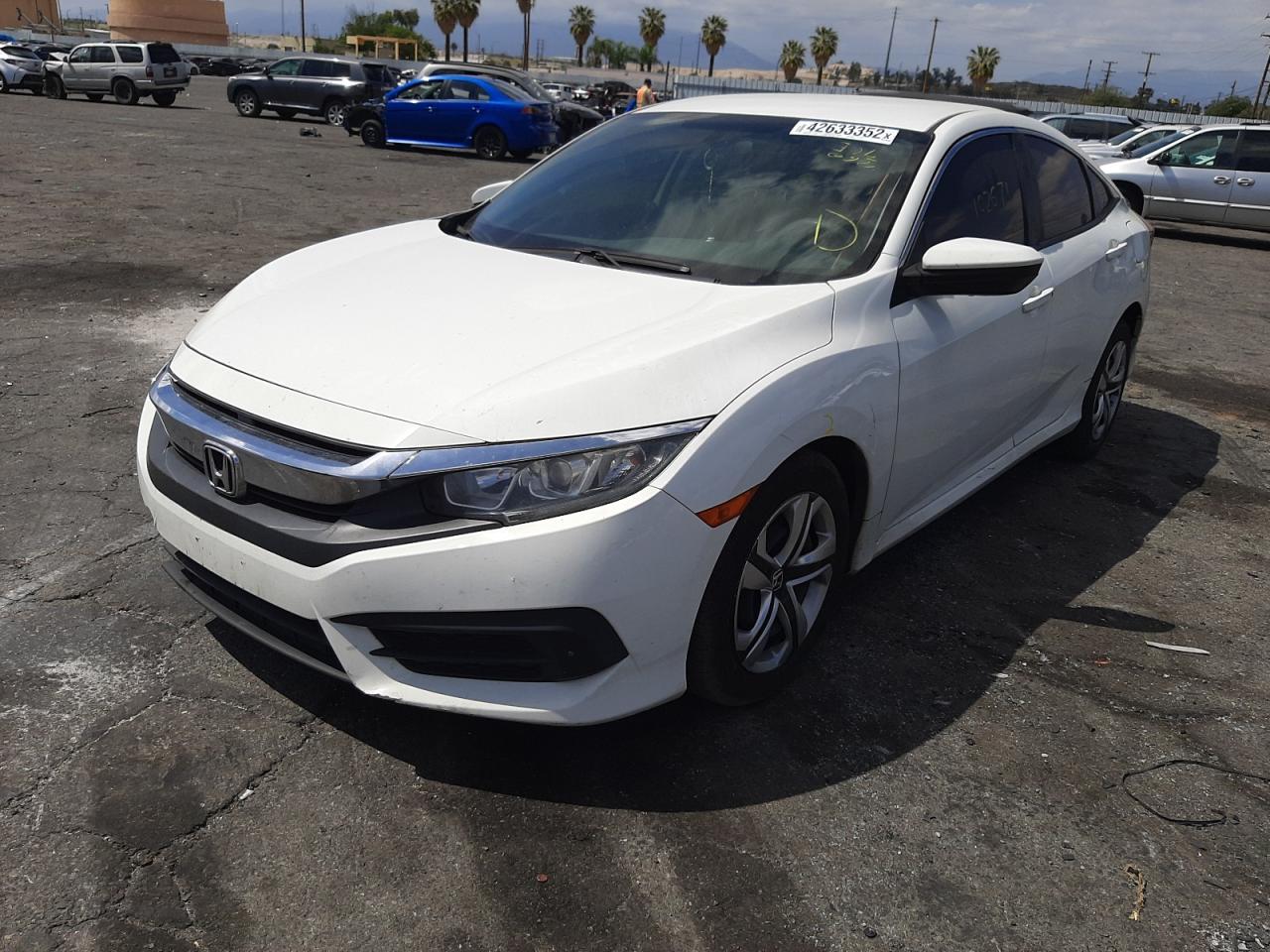 Photo 2 from auction – 2016 HONDA CIVIC LX with VIN 19XFC2E54GE022215