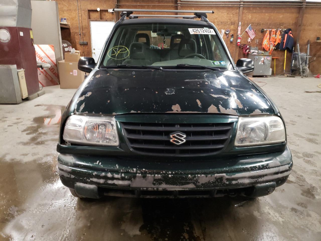 Photo 9 from auction – 2003 SUZUKI VITARA JLX with VIN 2S3TD52V336102770