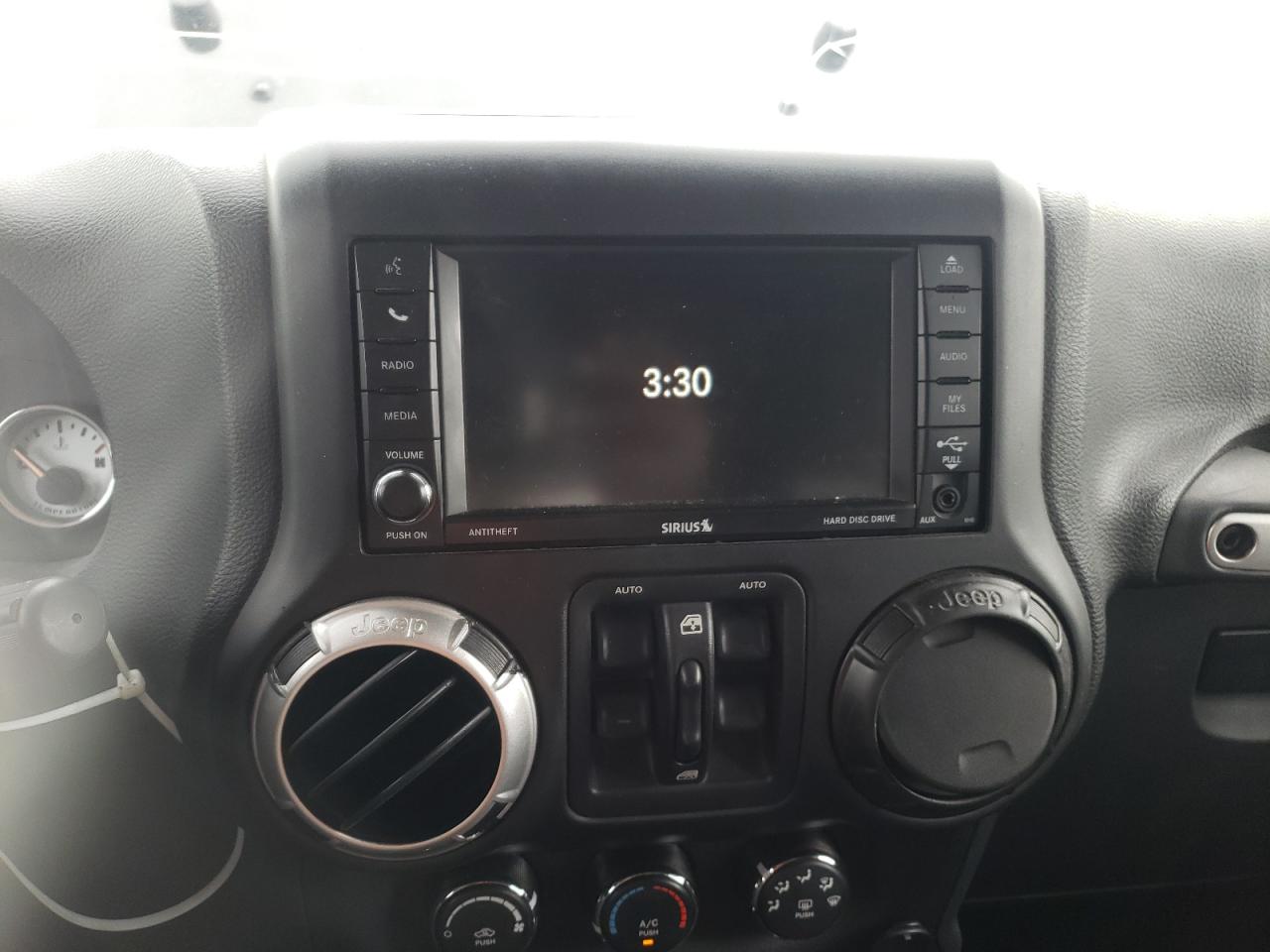Photo 9 from auction – 2015 JEEP WRANGLER U with VIN 1C4BJWEG0FL684375