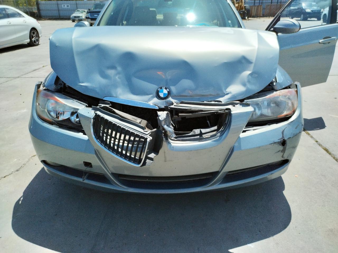 Photo 7 from auction – 2006 BMW 325 I with VIN WBAVB13596KX42565