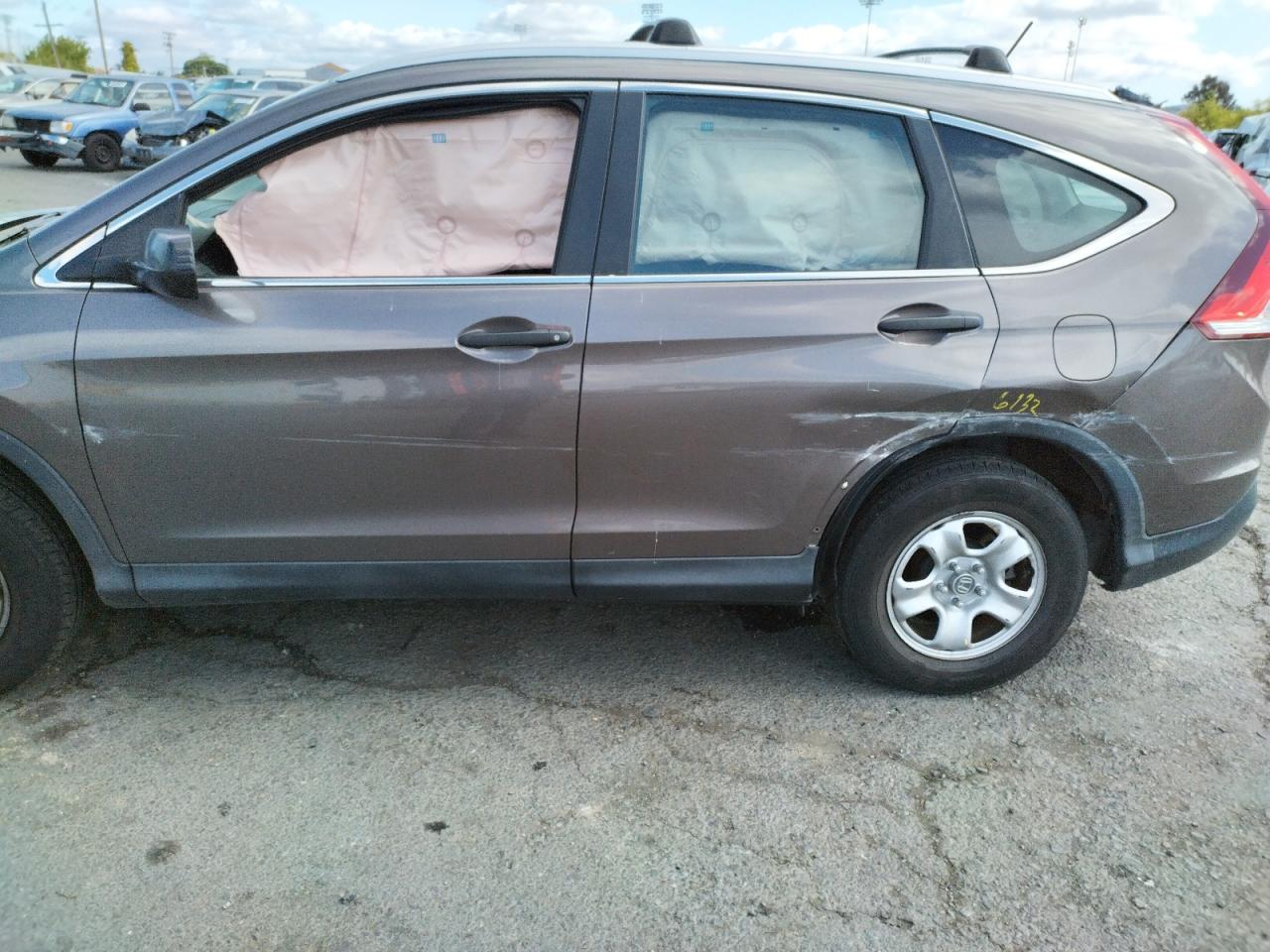 Photo 9 from auction – 2014 HONDA CR-V with VIN 2HKRM4H36EH622193