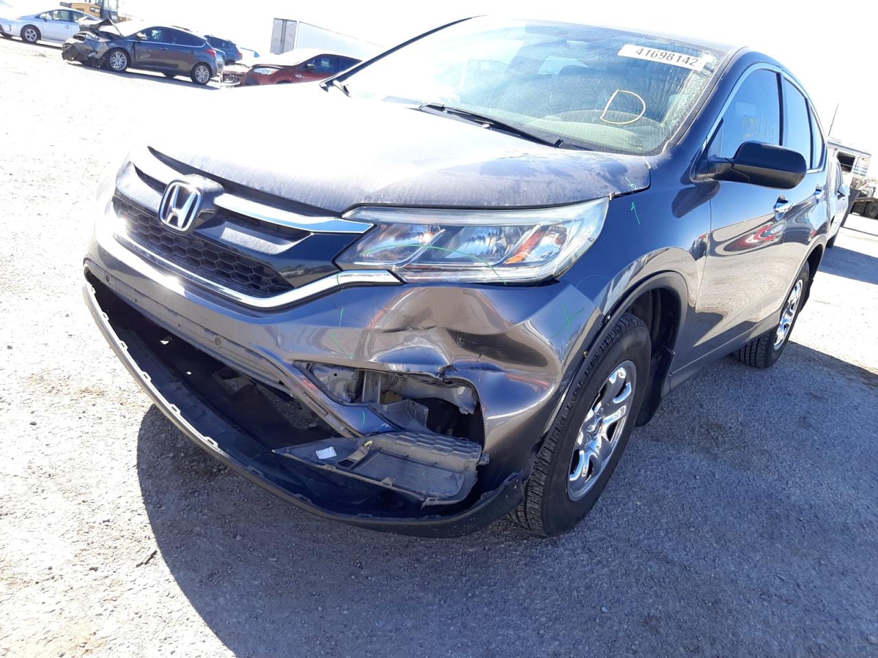Photo 9 from auction – 2015 HONDA CR-V LX with VIN 3CZRM3H31FG707344