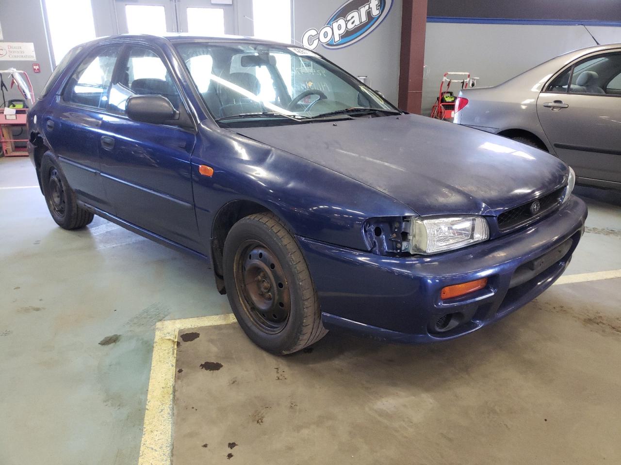SUBARU IMPREZA L 2000 with VIN JF1GF4351YH804385 - Photo from auction