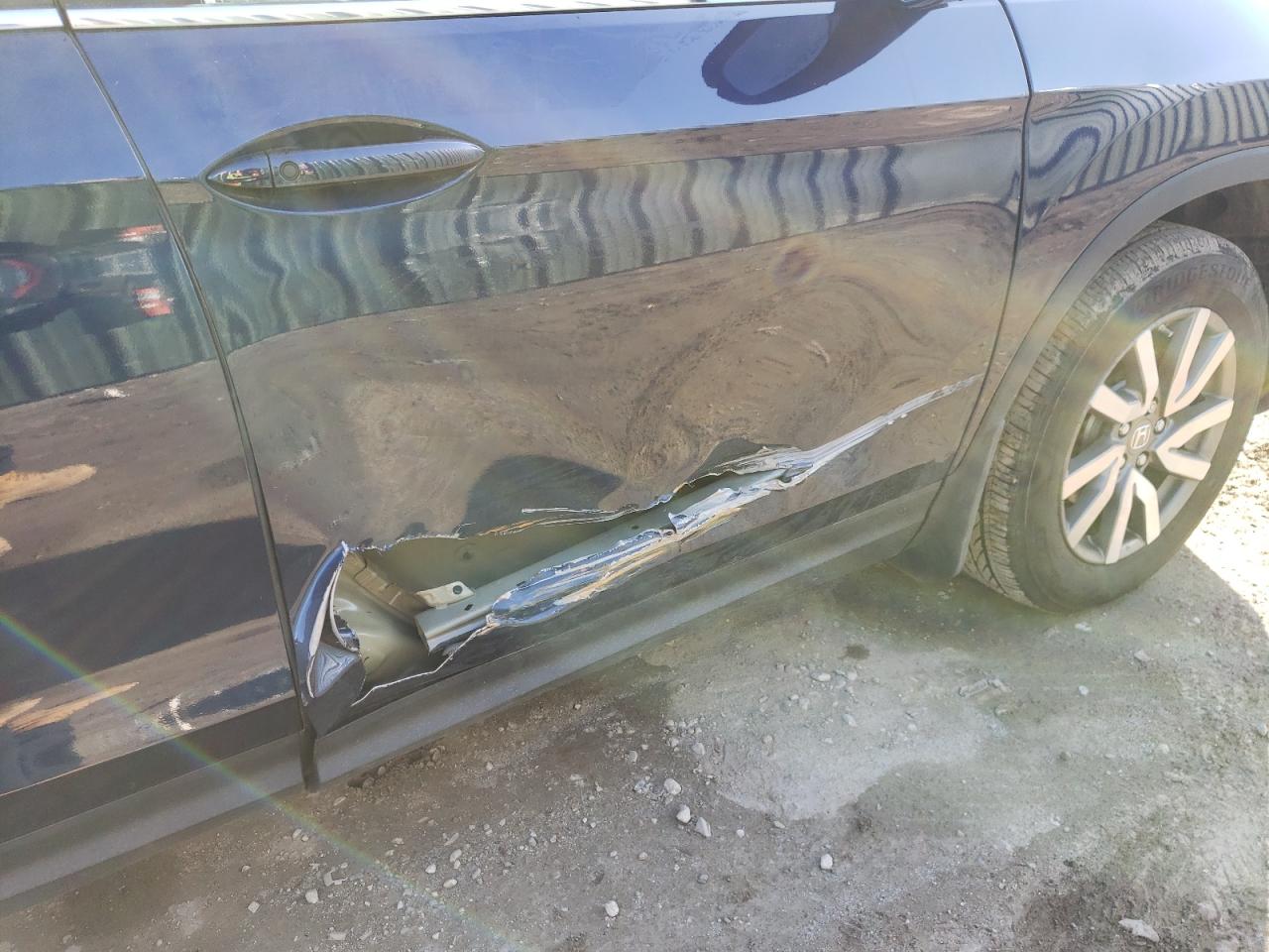 Photo 9 from auction – 2022 HONDA PILOT EXL with VIN 5FNYF6H52NB020540
