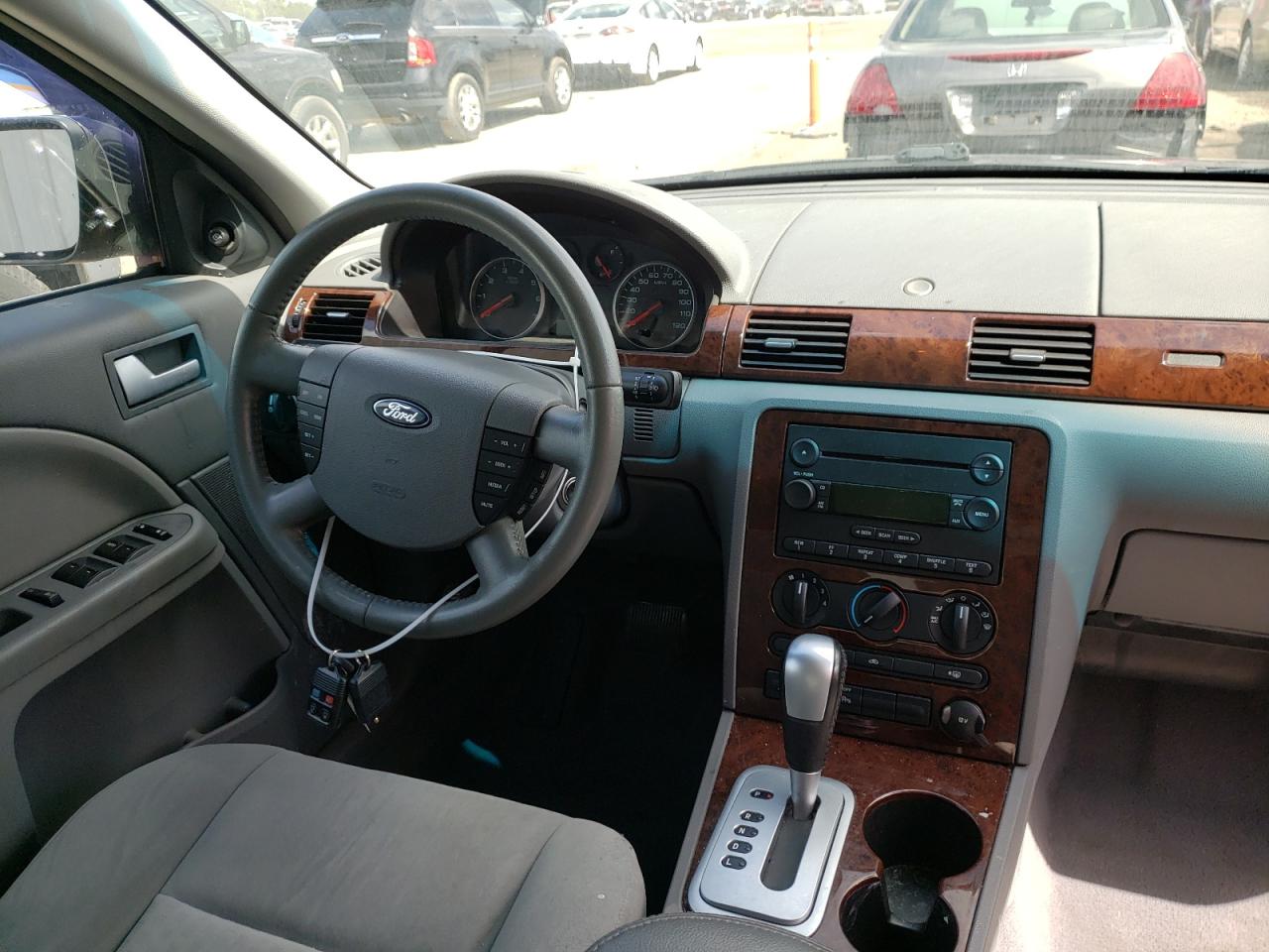 Photo 9 from auction – 2007 FORD FIVE HUNDR with VIN 1FAHP27127G144648