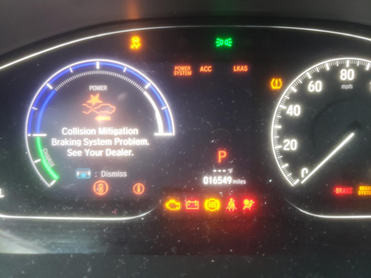 Photo 8 from auction – 2021 HONDA INSIGHT EX with VIN 19XZE4F52ME005278
